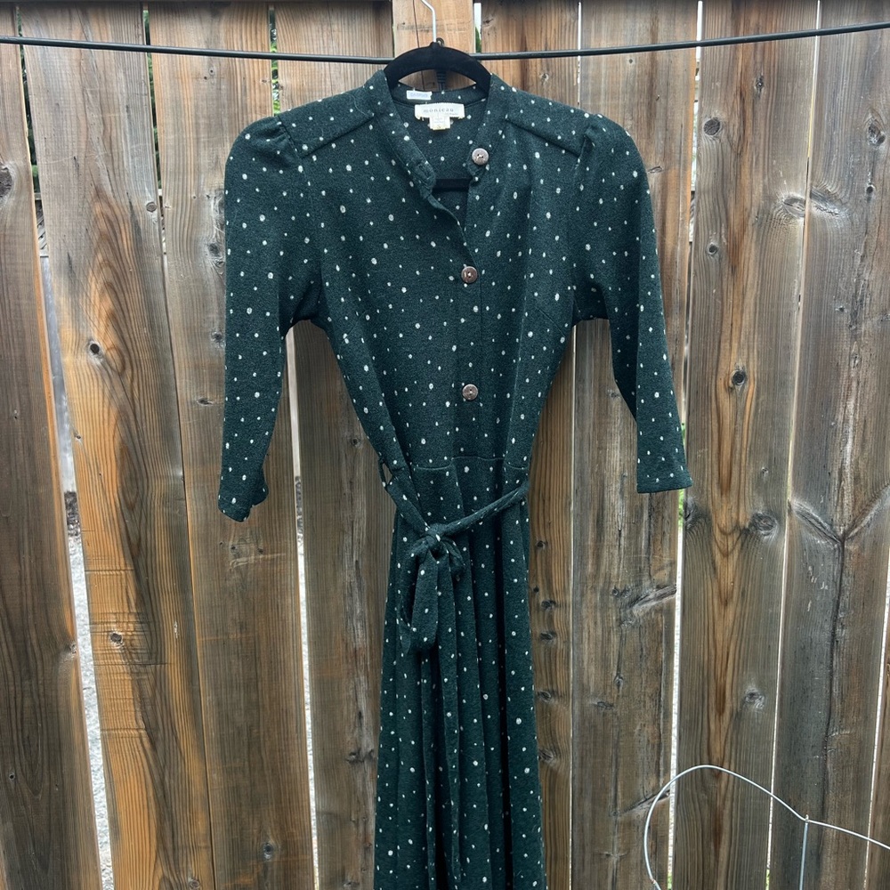 Women’s knit style green dress with polka dots